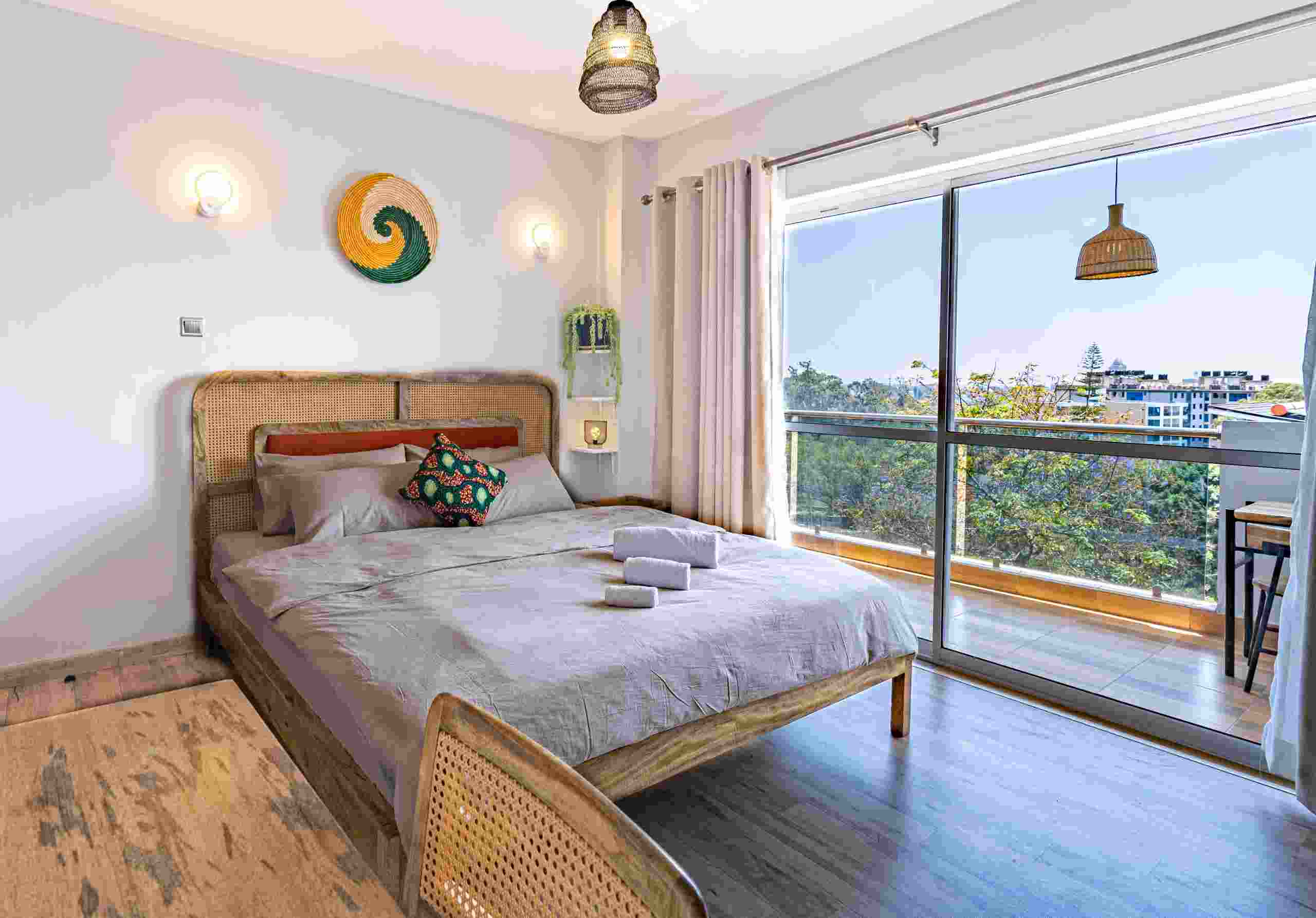 Master bedroom with ensuite bathroom and large wardrobe in Kileleshwa apartment