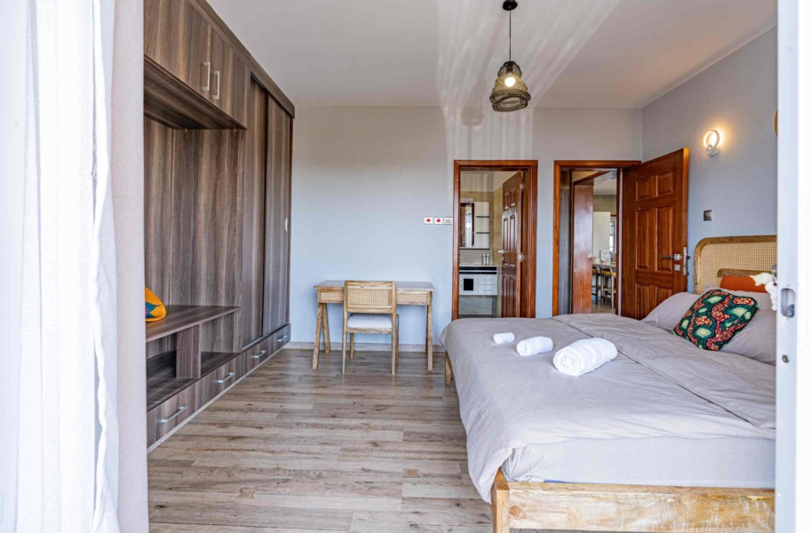Master bedroom with ensuite bathroom and large wardrobe in Kileleshwa apartment